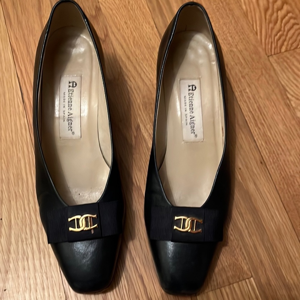 Women’s black pump shoes.